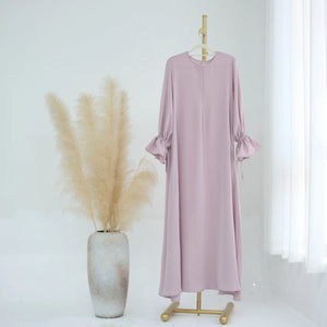 Abaya Dubaï à nœud ajustable rose pour femme – vue de face