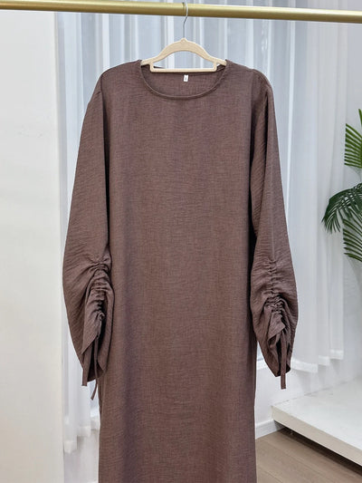 Abaya Marocaine Manches Nouées pour femme – coupe longue et finitions élégantes – Maison Layina