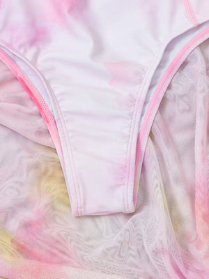 Détail du tissu extensible du burkini rose et du paréo en voile