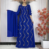 Abaya africaine bleu roi à smocks et broderies dorées avec étole