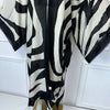 Kimono cardigan imprimé zèbre noir et ivoire – détail du tombé
