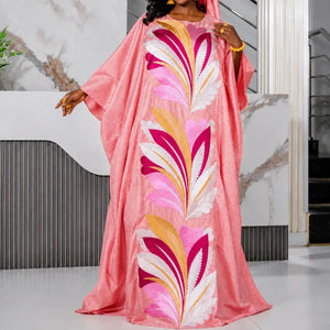 Robe boubou de mariage rose corail à broderies feuillage